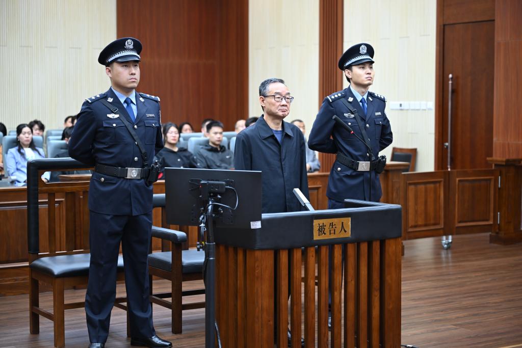 Tang Renjian, exjefe del Partido y ministro de Agricultura y Asuntos Rurales, comparece ante el Tribunal Popular Intermedio de Changchun, en la provincia de Jilin, noreste de China. Foto: CCTV News